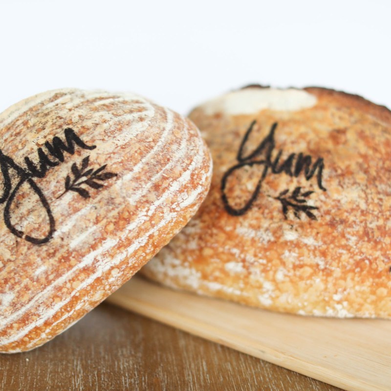 bread with the world yum on it