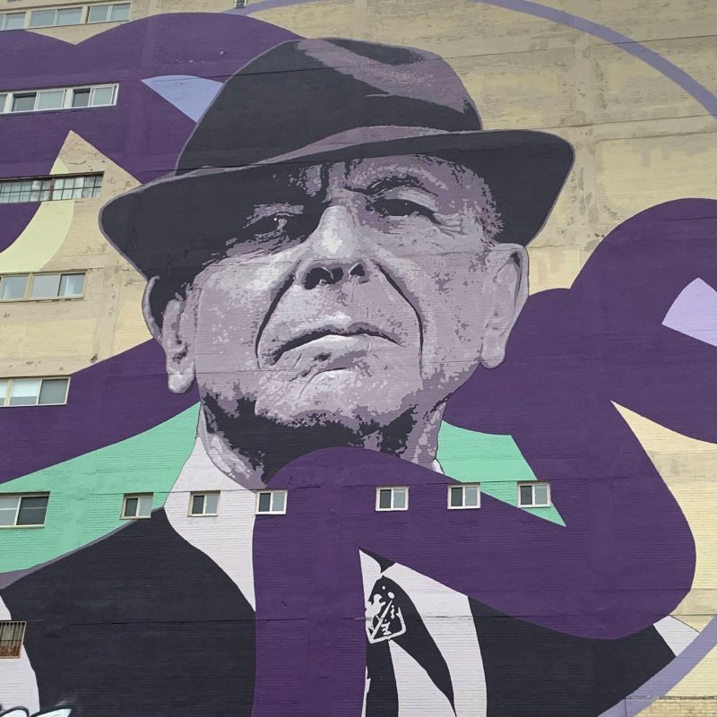 a painting of a man wearing a hat