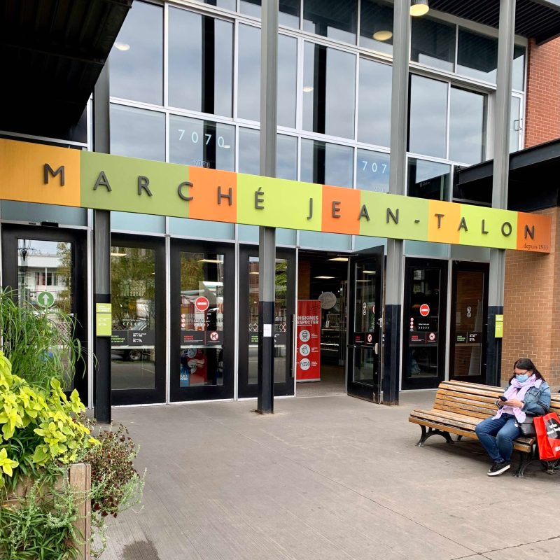 a person standing in front of a building