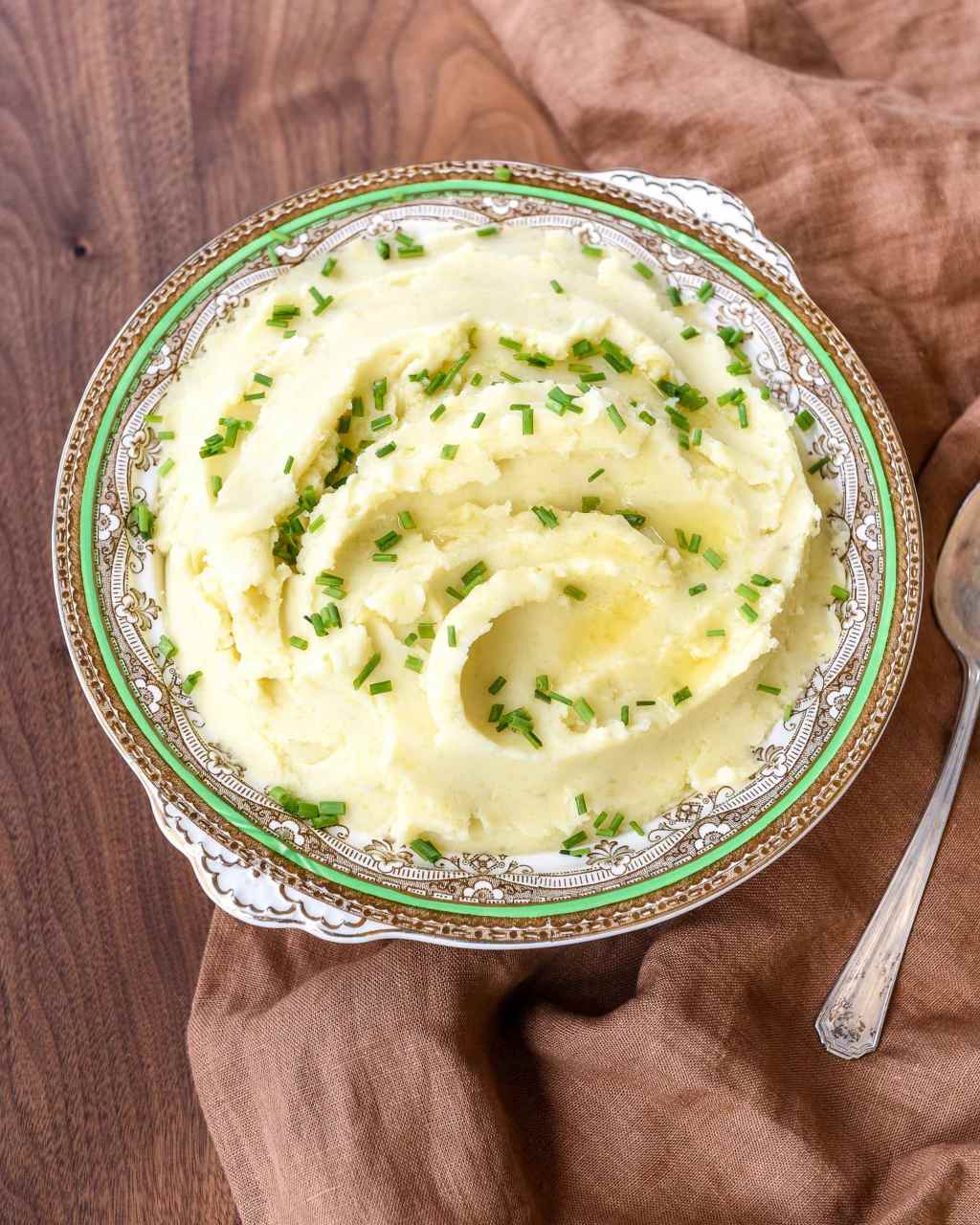 a close up of mashed potatoes on a table