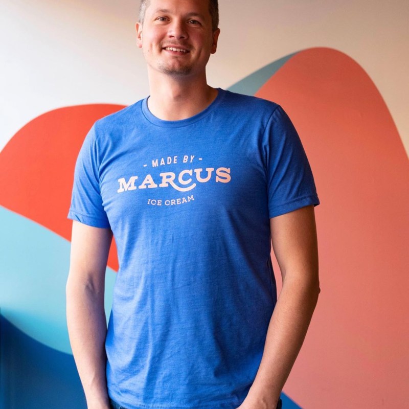 a man in a blue shirt