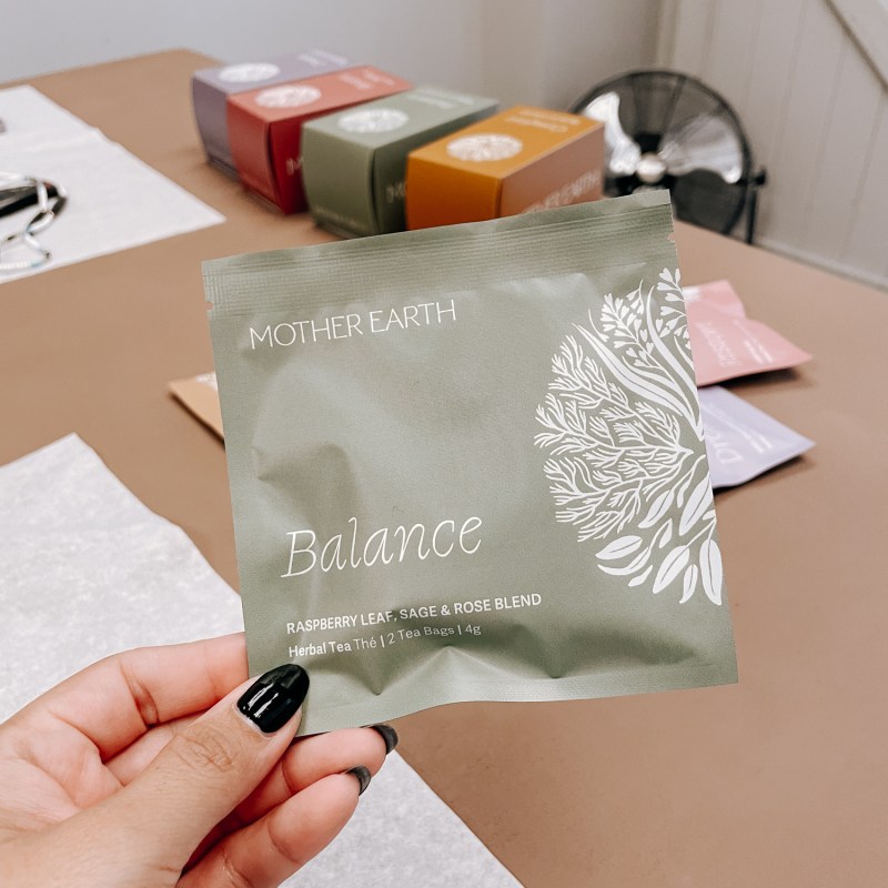 a hand holding a piece of paper