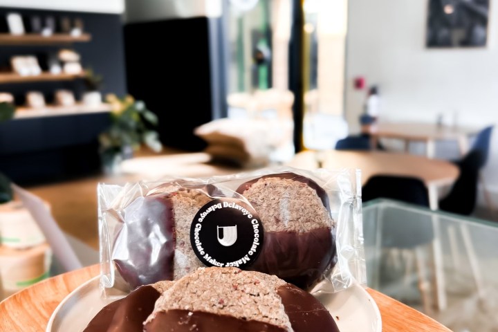 a chocolate cake sitting on top of a table