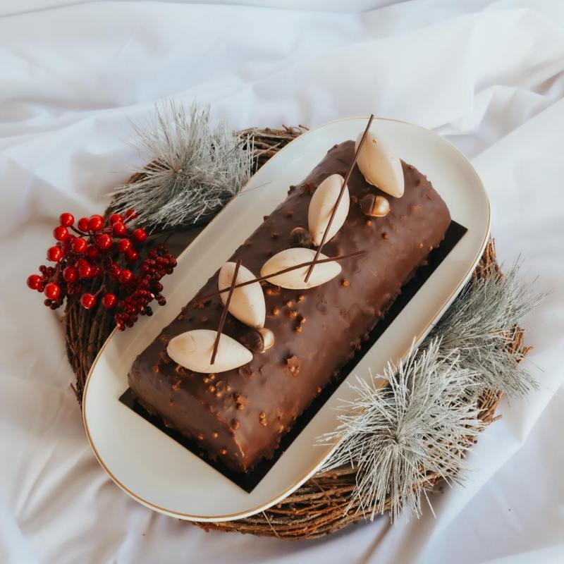 a piece of cake sitting on top of a bed