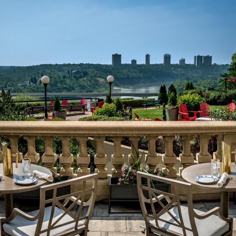 a group of people sitting at a dock