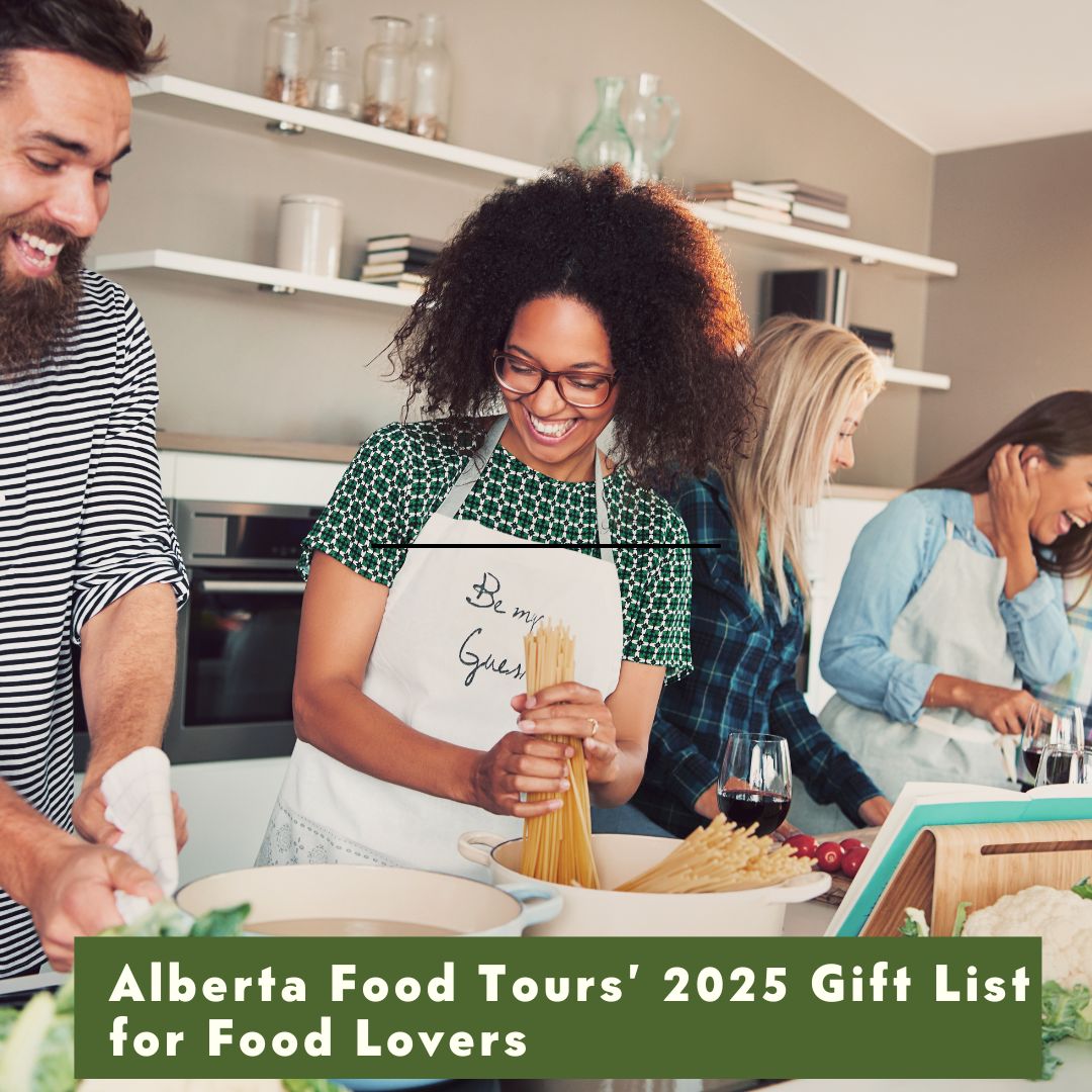 Group cooking in kitchen, woman holding pasta, smiling, text about Alberta Food Tours 2025 Gift List.