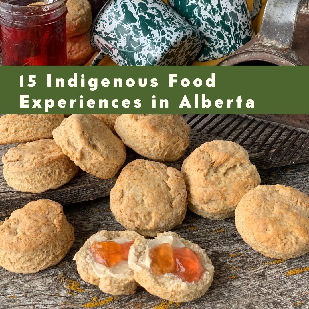 Biscuits with jam, a kettle, and text: '15 Indigenous Food Experiences in Alberta'.